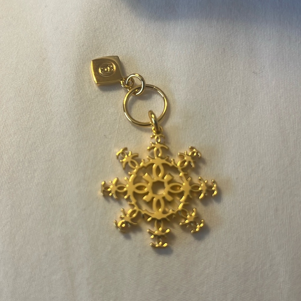 Authentic Chanel snowflake charm